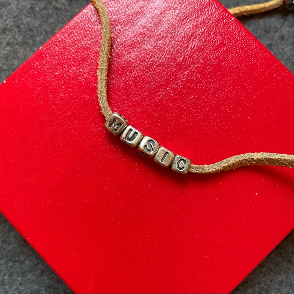 Sterling Silver and Leather MUSIC Necklace